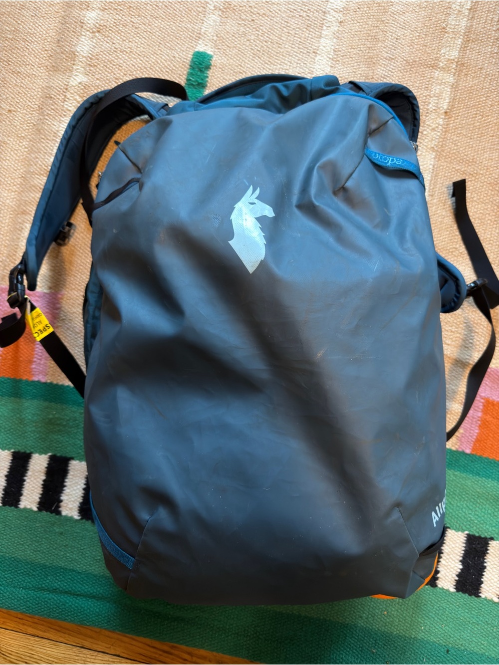 Cotopaxi blue backpack with light blue logo